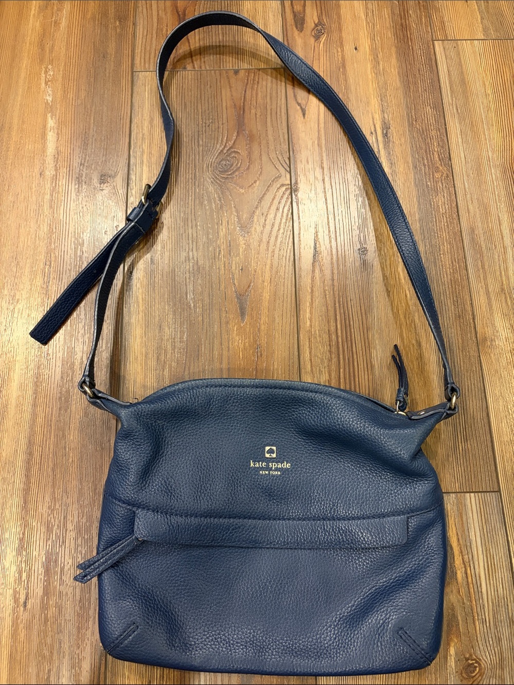 kate spade navy leather crossbody with gold logo